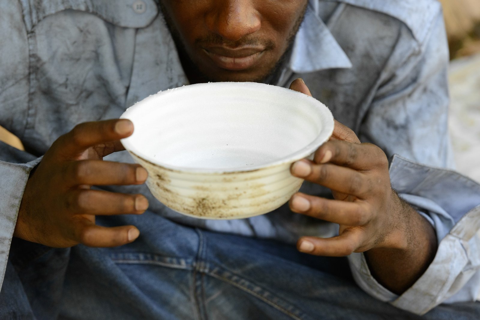 hands-of-young-homeless-african-man-begging-for-food.jpg