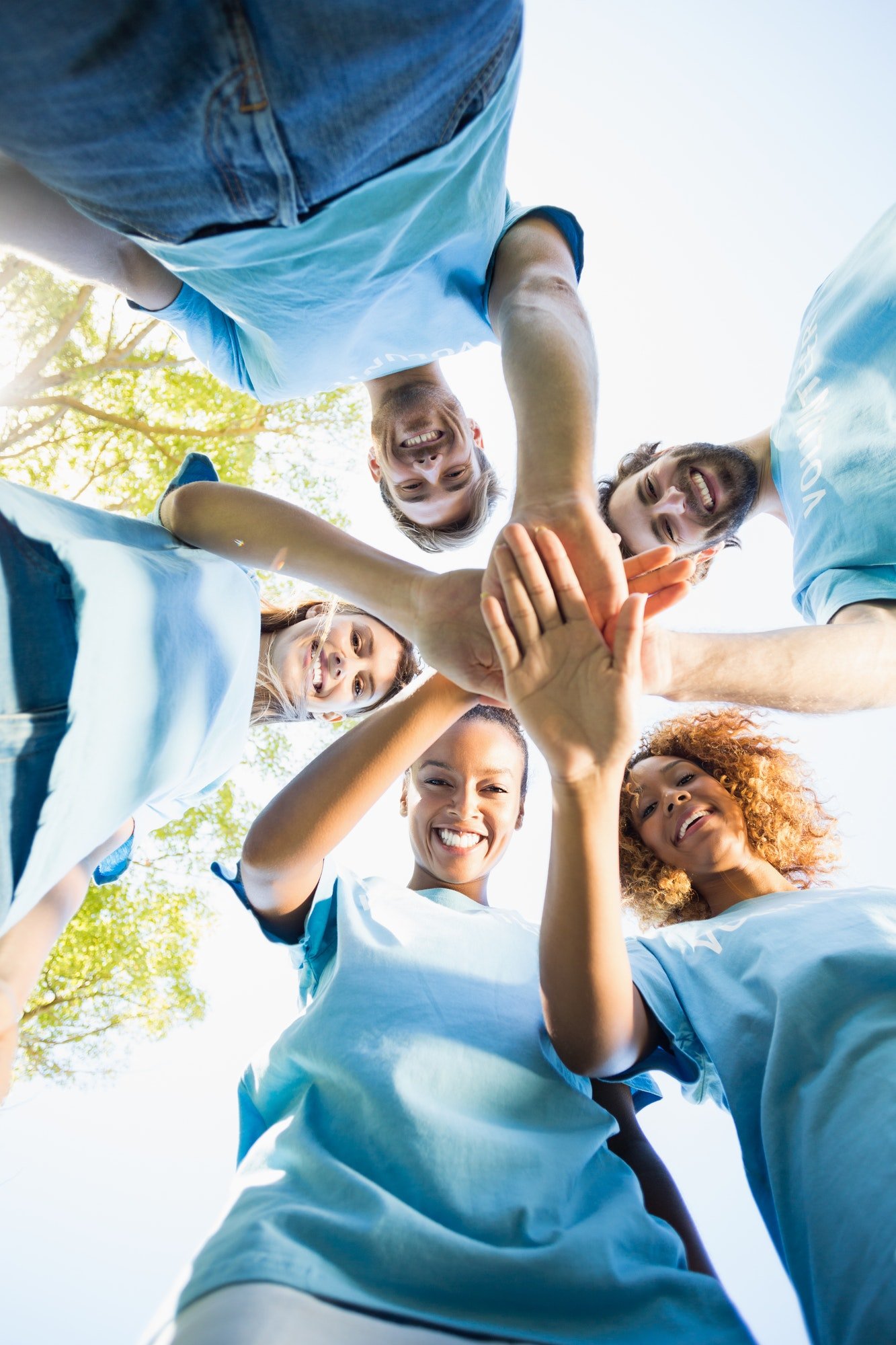 portrait-of-volunteer-group-forming-huddles.jpg