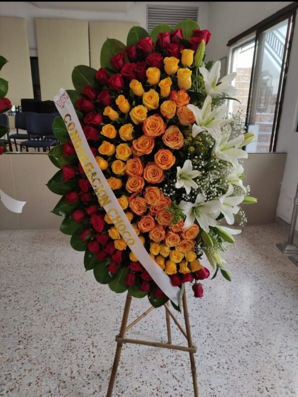 Corona Fúnebre con Rosas Exclusivas amarillas, naranjas y Rojas